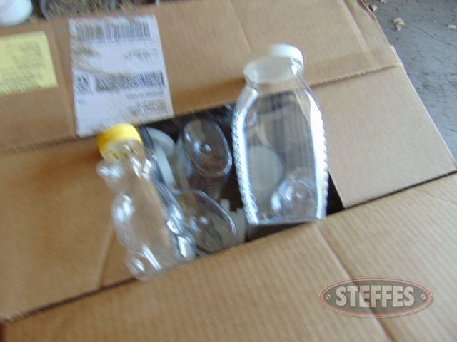 (3) boxes of plastic-handle jugs for honey,_1.jpg